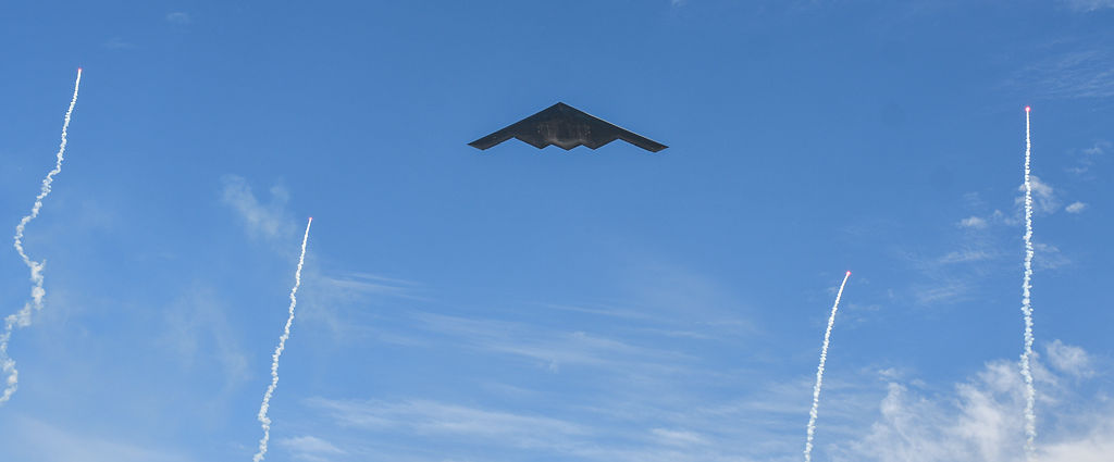 A B-2 Spirit stealth bomber flies over Faurot Field